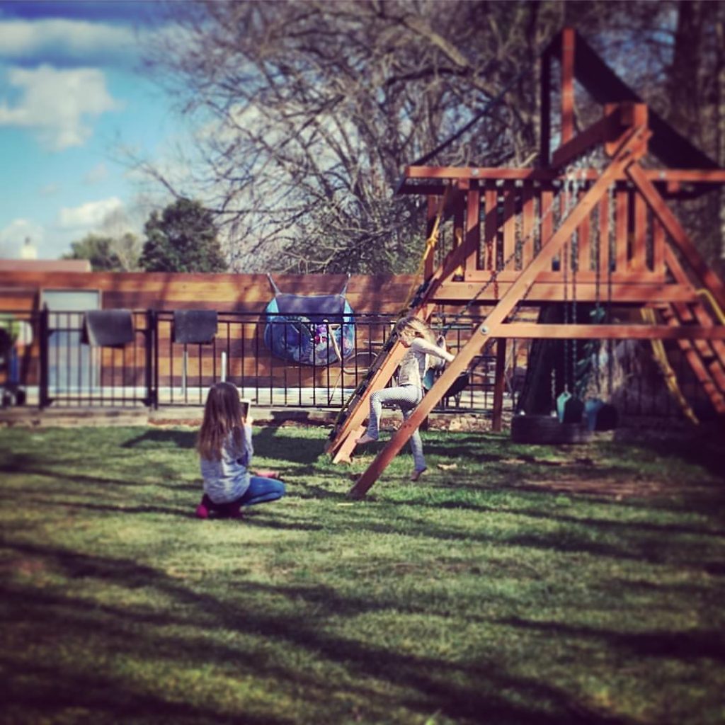 Photographing her sister